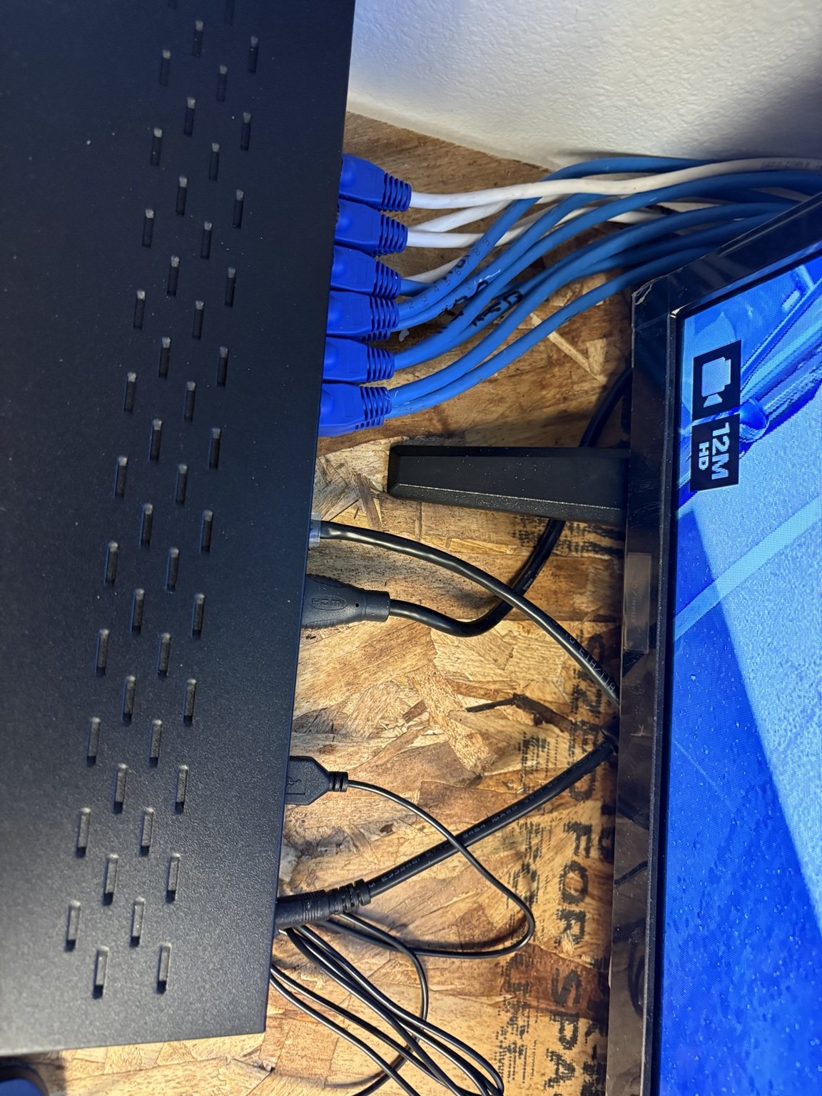 Network cabling connected to commercial surveillance recorder